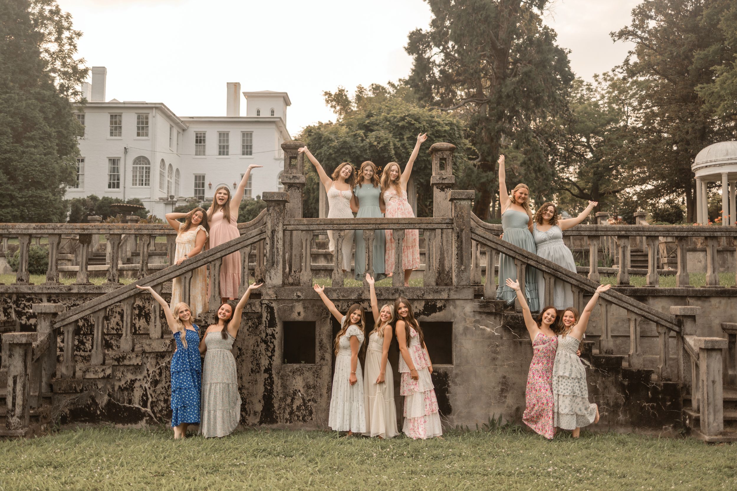 A sequence of joyful wedding party photos showing people jumping and celebrating in front of a historic mansion.