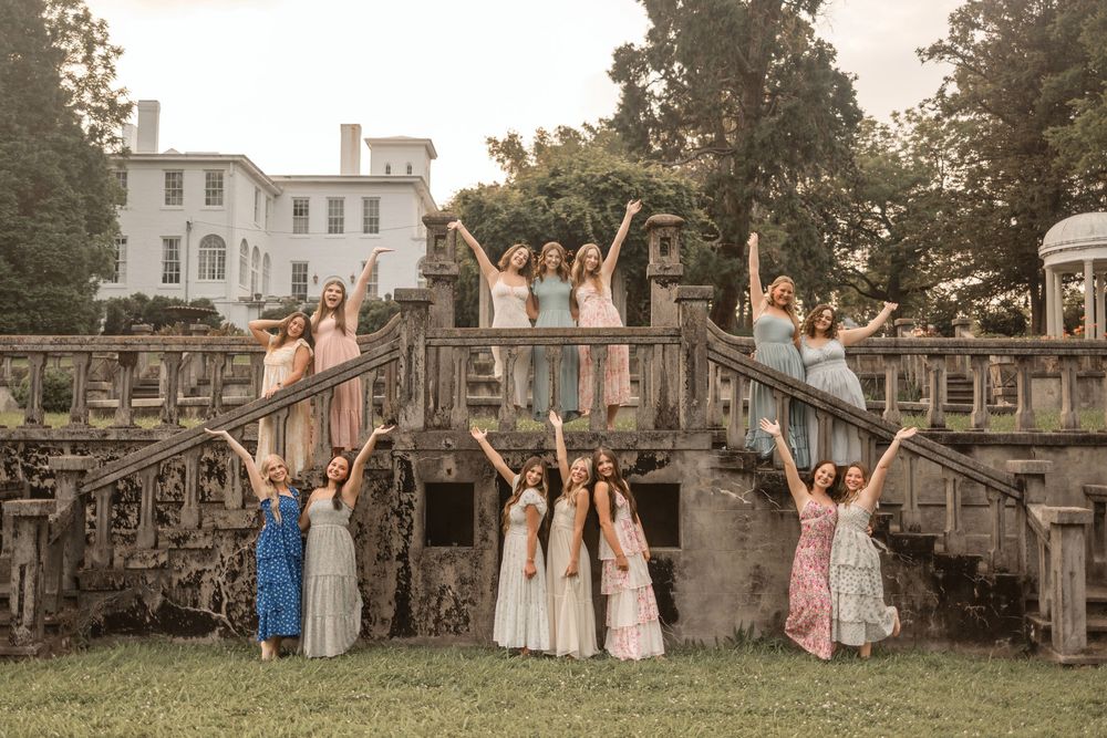 A sequence of joyful wedding party photos showing people jumping and celebrating in front of a historic mansion.