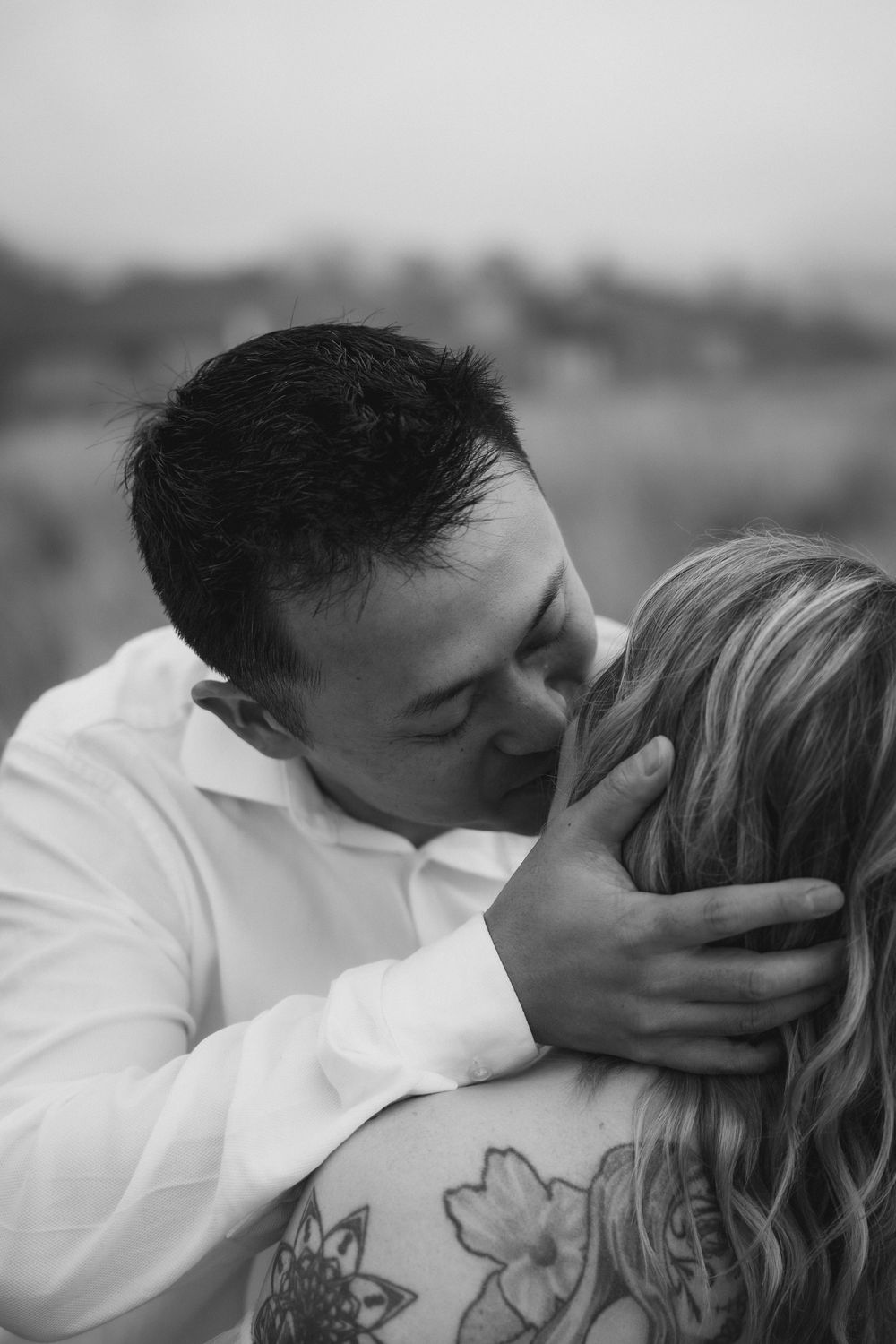Intimate black and white photo sequence of couple sharing tender moments.
