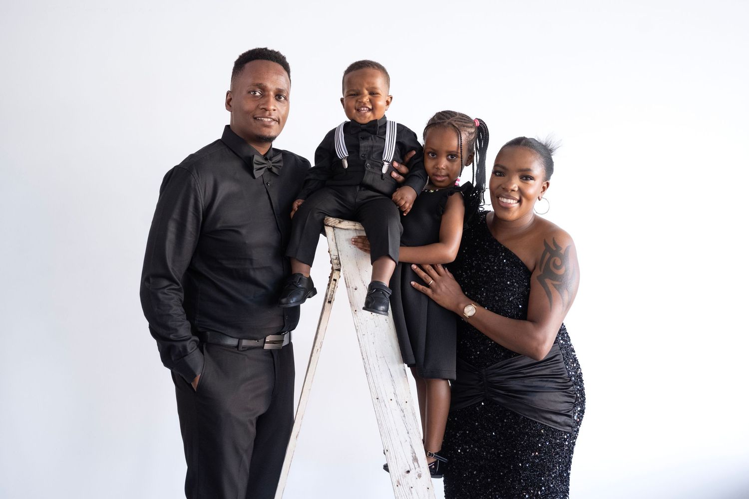Professional studio portrait session against clean white background.