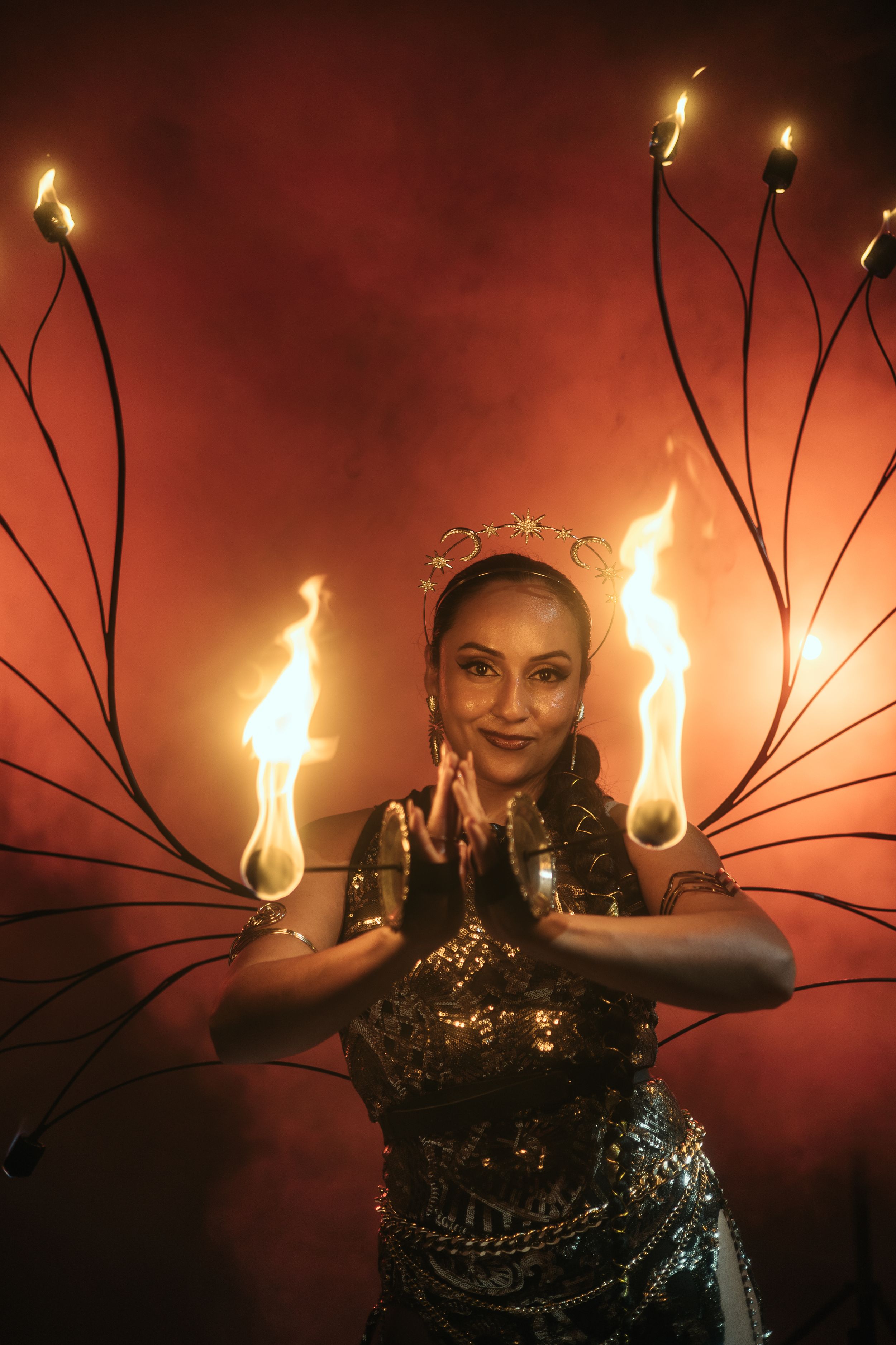 Cinematic fire performer portrait by Mannyportraits in Fort Lauderdale. Intense flame glow with expressive and controlled movement.