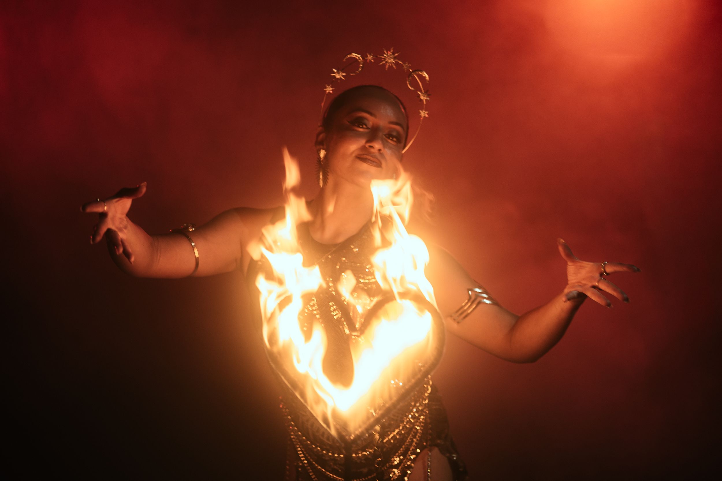 Cinematic fire performer portrait by Mannyportraits in Fort Lauderdale. Intense flame glow with expressive and controlled movement.