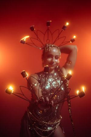 Cinematic editorial performance photography in Miami featuring artistic fire styling for creative brand campaigns by MannyPortraits