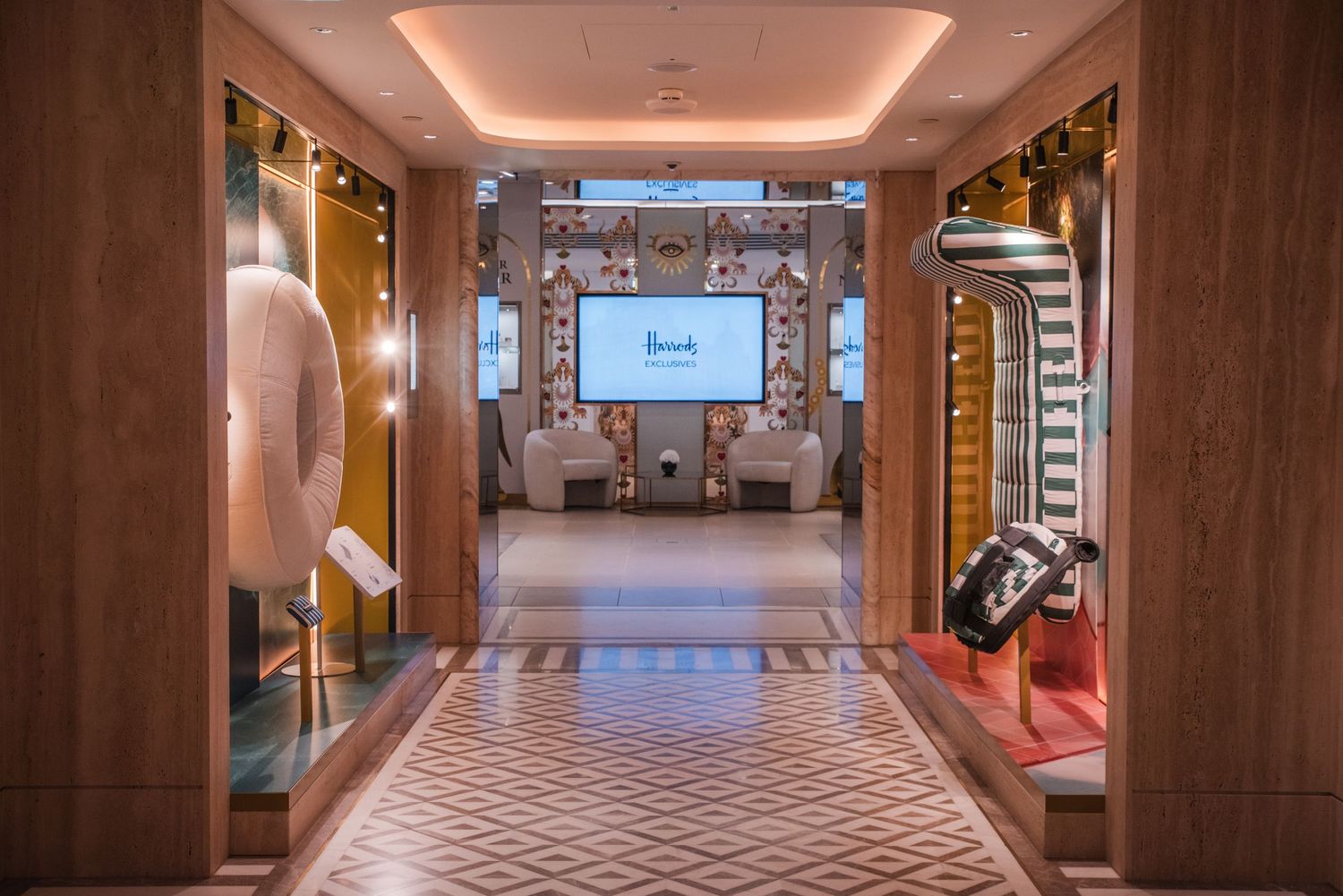 Modern hallway with wood paneling and ambient lighting creating symmetrical perspective.