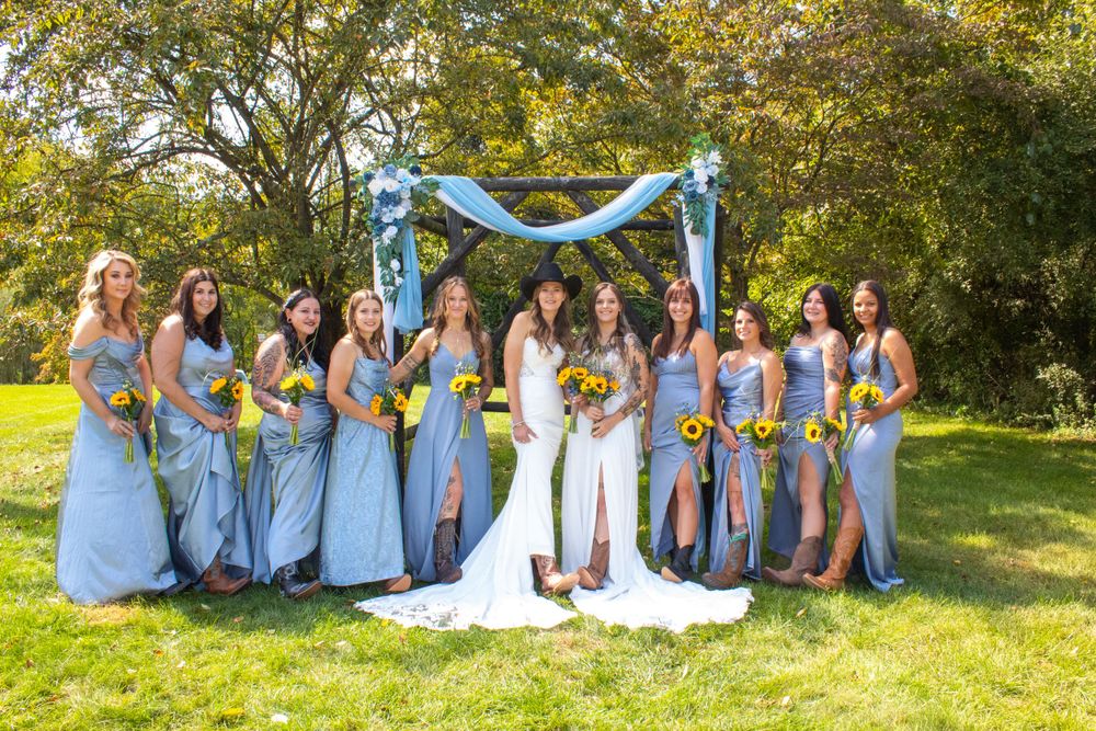 Wedding party in light blue dresses posed outdoors under blue arch with sunflowers, wedding, brides, bridesmaids, Jacks Barn, Oxford, NJ