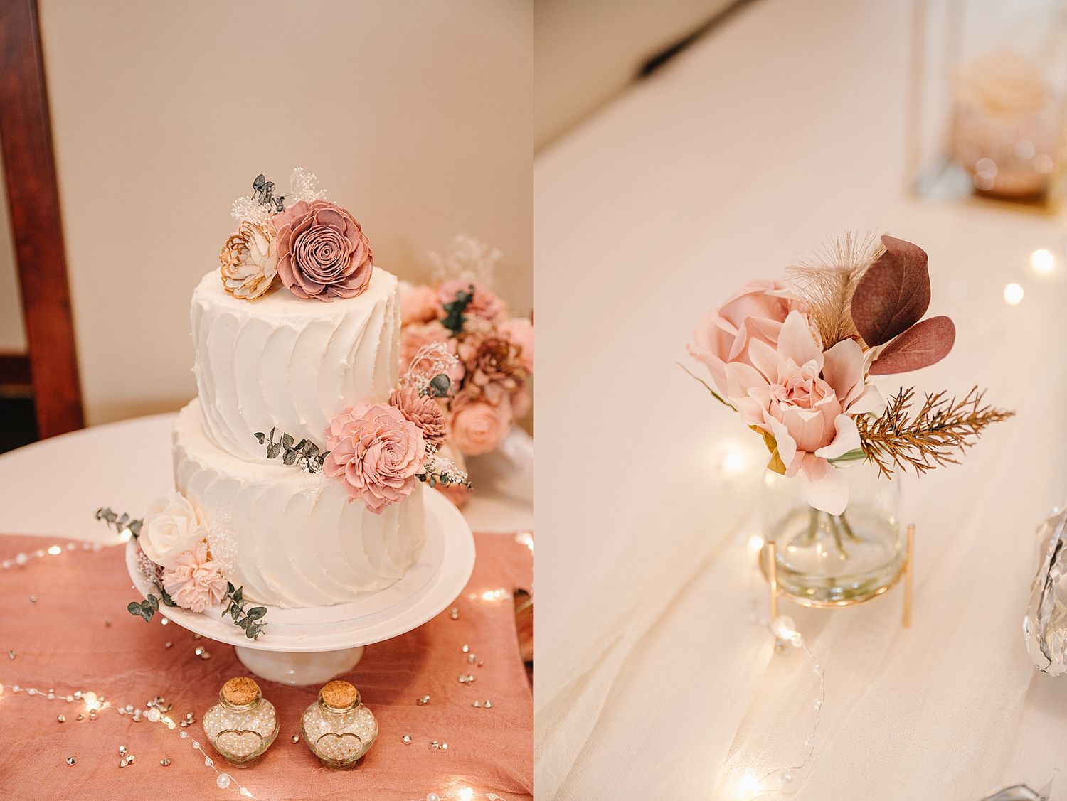 Elegant two-tier white wedding cake with blush pink roses and floral decorations on a rose gold sequined tablecloth.