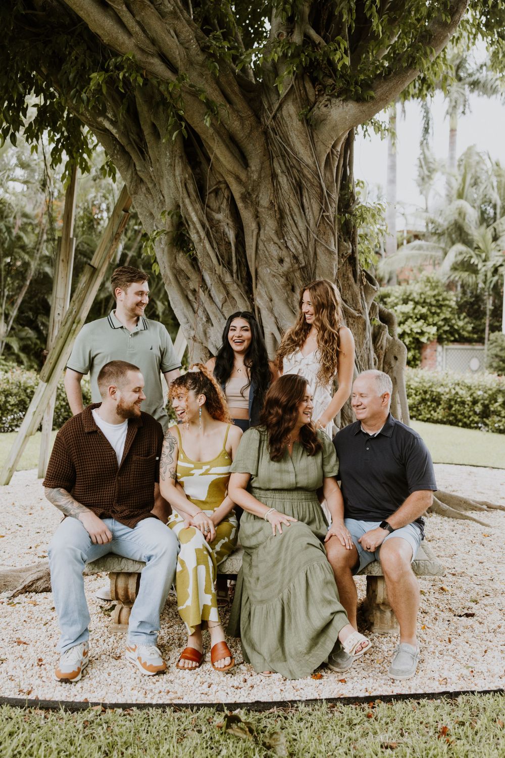 Large family photos in Downtown Palm Beach on the island, at a park and the beach captured by Lindsay McDow Photography.