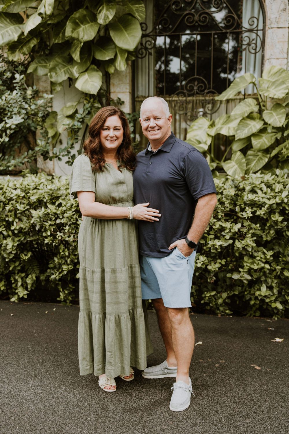 Large family photos in Downtown Palm Beach on the island, at a park and the beach captured by Lindsay McDow Photography