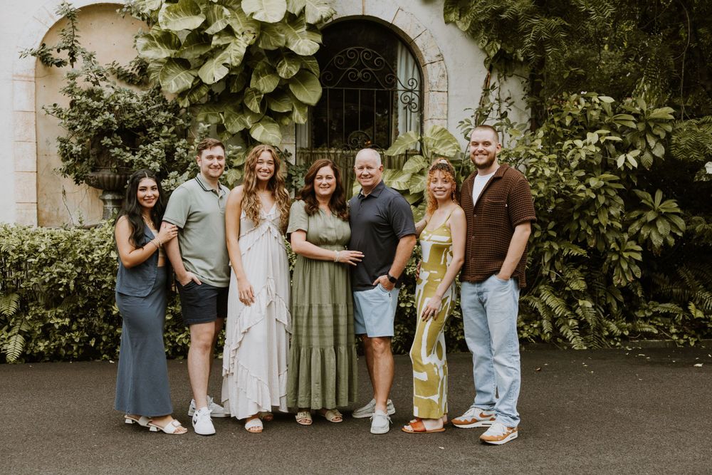 Large family photos in Downtown Palm Beach on the island, at a park and the beach captured by Lindsay McDow Photography