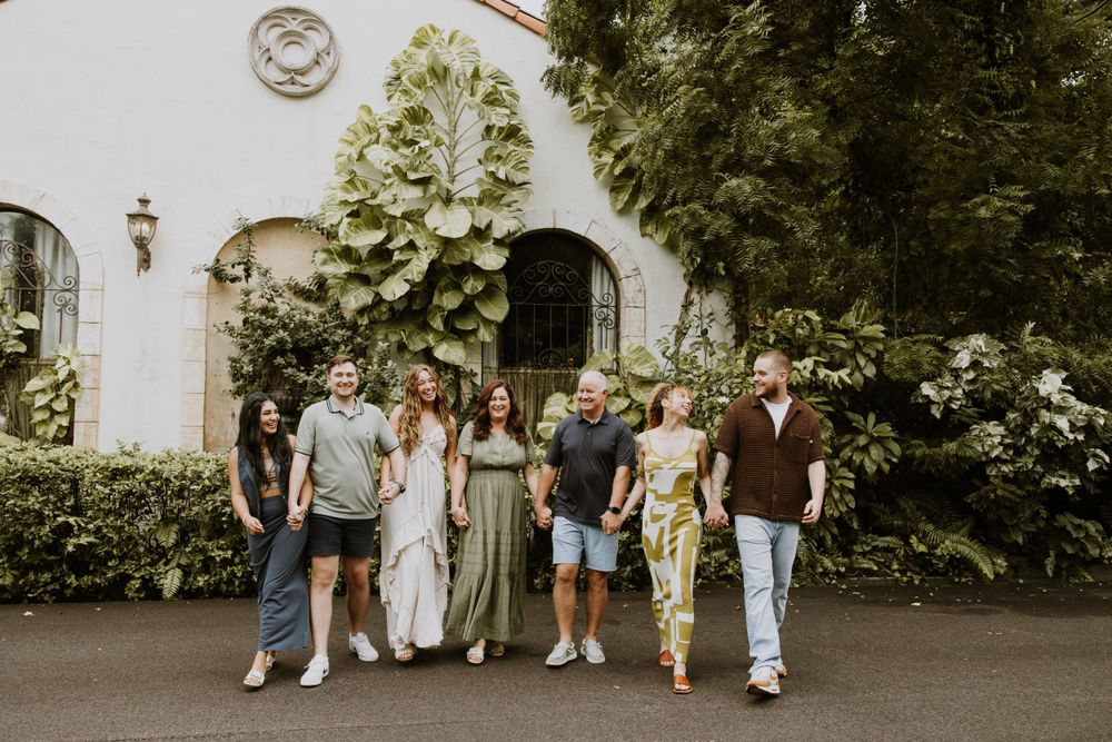 Large family photos in Downtown Palm Beach on the island, at a park and the beach captured by Lindsay McDow Photography