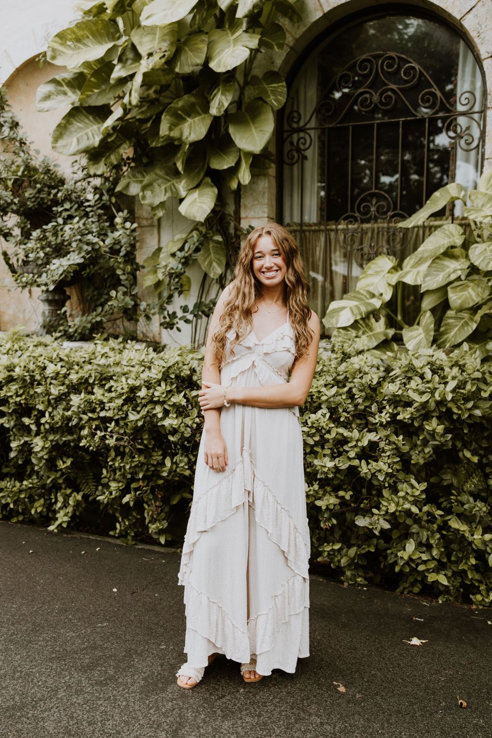 Large family photos in Downtown Palm Beach on the island, at a park and the beach captured by Lindsay McDow Photography