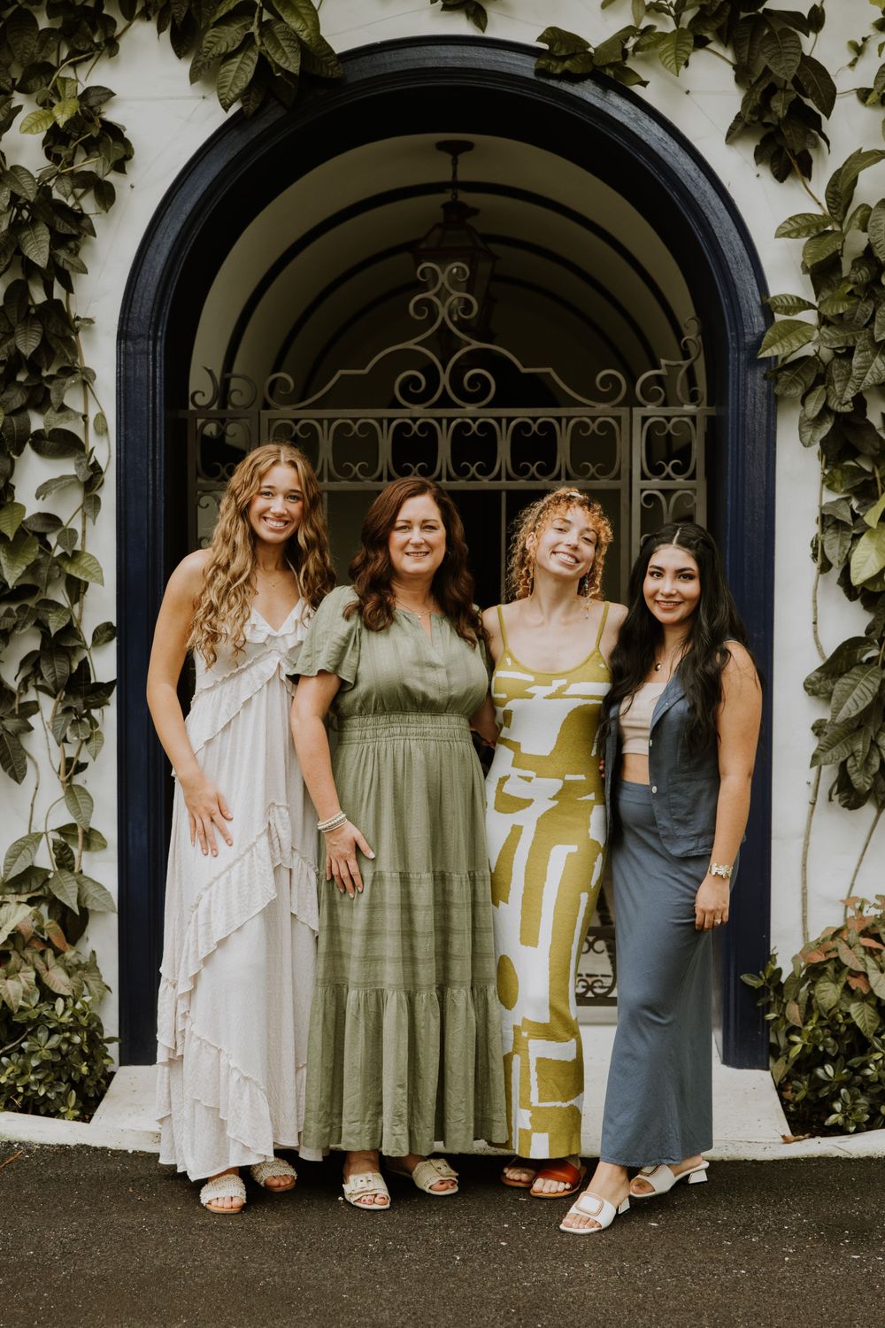 Large family photos in Downtown Palm Beach on the island, at a park and the beach captured by Lindsay McDow Photography