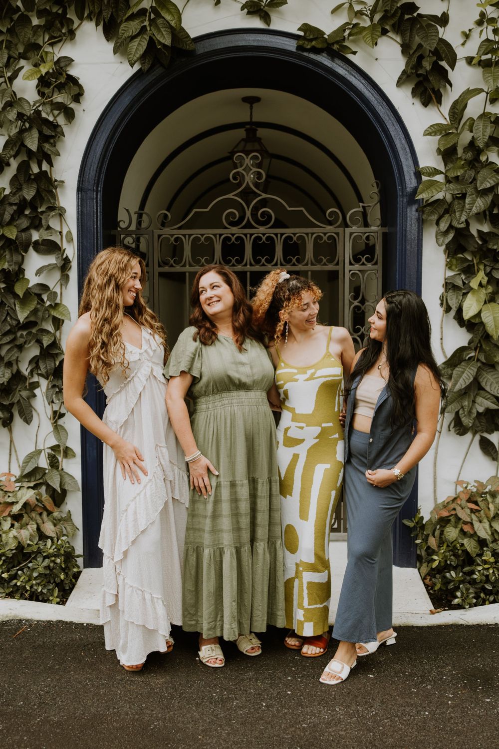 Large family photos in Downtown Palm Beach on the island, at a park and the beach captured by Lindsay McDow Photography