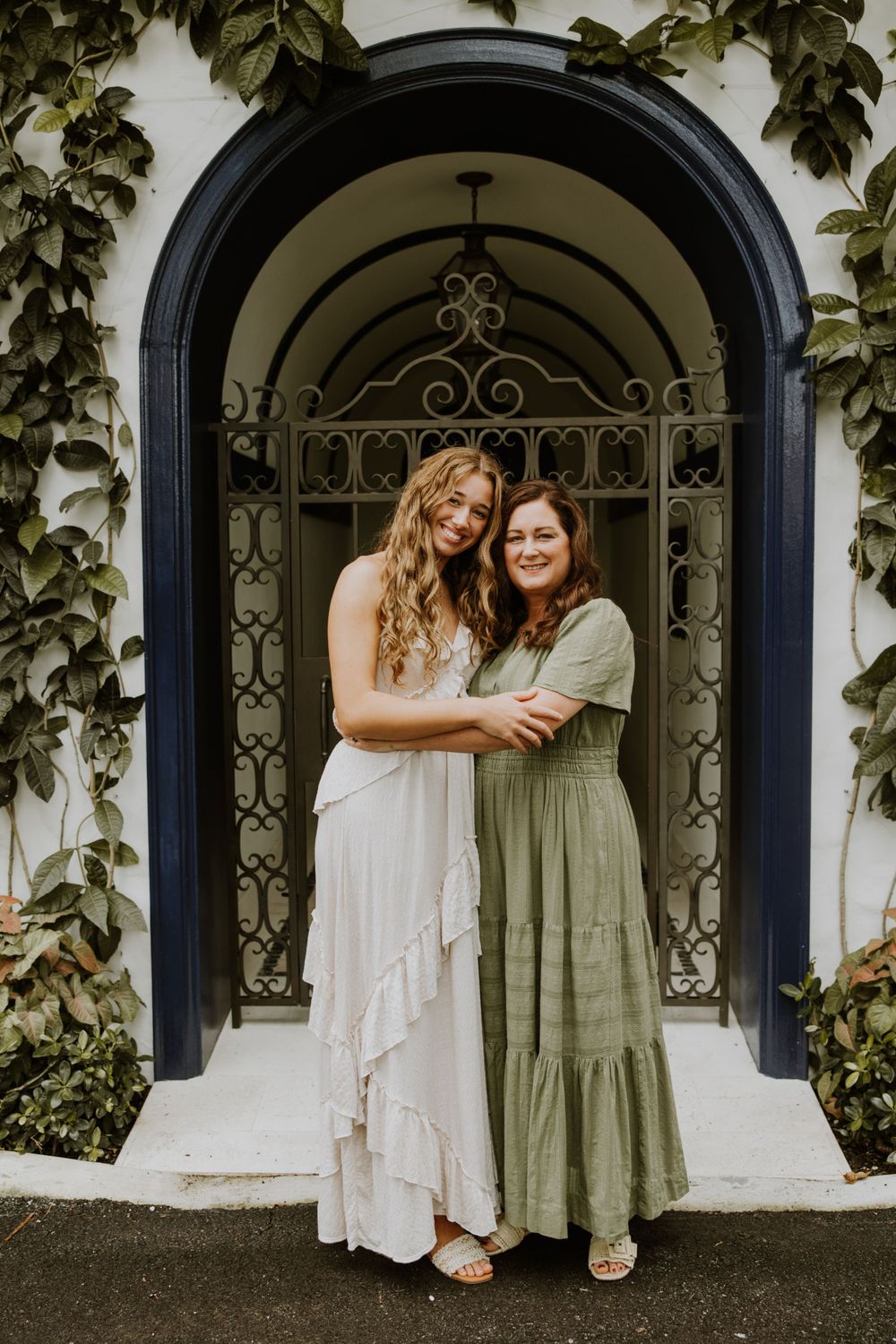 Large family photos in Downtown Palm Beach on the island, at a park and the beach captured by Lindsay McDow Photography