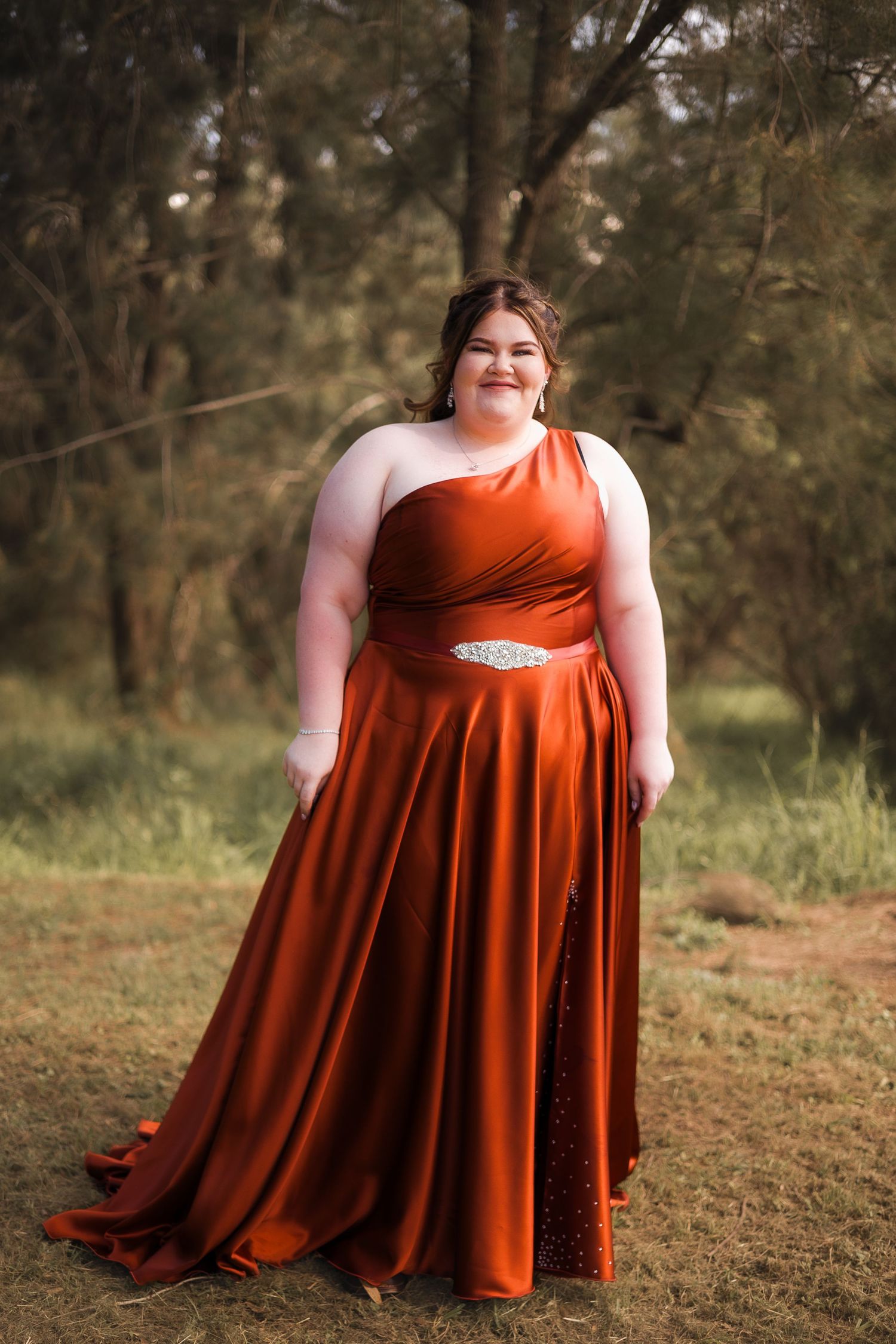 Formal photoshoot at Kingaroy Dam in South Burnett, featuring a person in an elegant formal dress for grade 12 formal