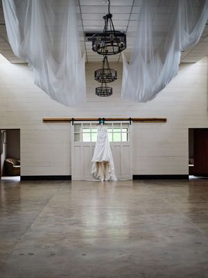 Wedding dress hanging in wedding space.

Indiana Weddings
Illinois Weddings
Michigan Weddings
Weddings