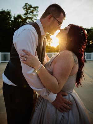 A couple embraces in a romantic sunset moment on their wedding day.

Indiana Weddings
Illinois Weddings
Michigan Weddings
Weddings