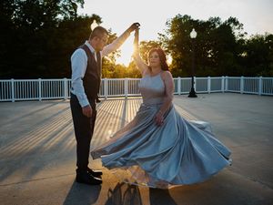 A wedding couple dances together at sunset on a deck.

Indiana Weddings
Illinois Weddings
Michigan Weddings
Weddings