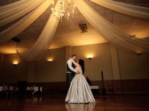 A final dance captured in a dimly lit ballroom with draped fabric ceiling decor.

Indiana Weddings
Illinois Weddings
Michigan Weddings