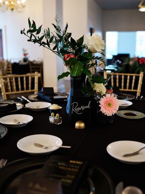 Elegant table settings with white plates on dark tablecloths at wedding.

Indiana Weddings
Illinois Weddings
Michigan Weddings
Weddings