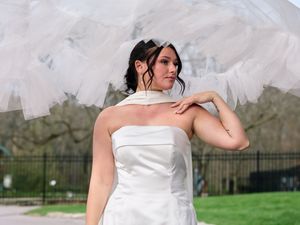 A bride poses while veil falls over her.

Indiana Weddings
Illinois Weddings
Michigan Weddings
Weddings