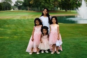 Daughters pose together on a lush green golf course with a fountain in the background.
Indiana Weddings
Illinois Weddings
Michigan Weddings