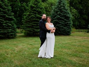 A wedding couple embraces on a lawn with tall evergreen trees in the background.

Indiana Weddings
Illinois Weddings
Michigan Weddings