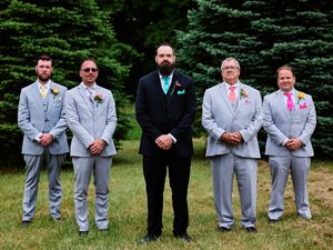 Groomsmen stand together outdoors against evergreen trees at a wedding.

Indiana Weddings
Illinois Weddings
Michigan Weddings
Weddings