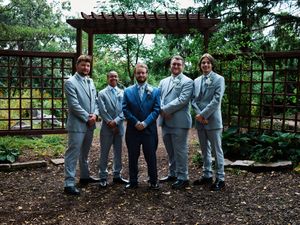 Groomsmen pose playfully in a garden setting.

Indiana Weddings
Illinois Weddings
Michigan Weddings
Weddings