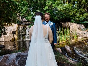 A bride and groom share first look at waterfall on their wedding day.

Indiana Weddings
Illinois Weddings
Michigan Weddings
Weddings