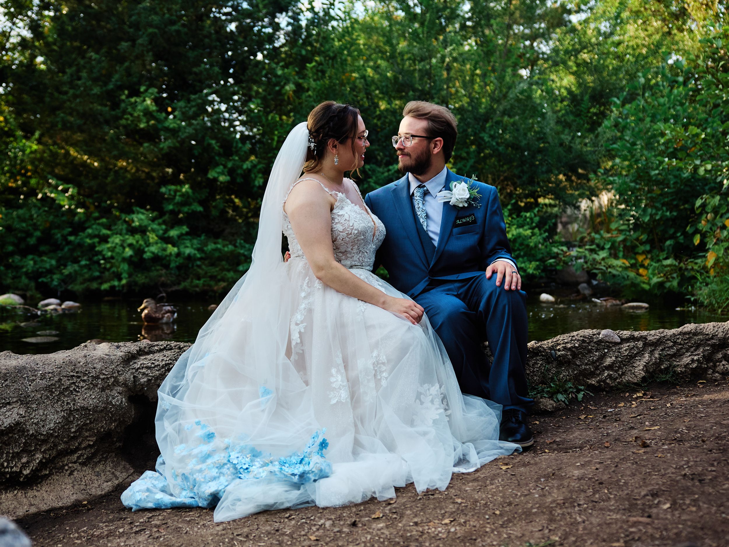 A wedding couple sits together on a rocky outdoor path surrounded by lake.

Indiana Weddings
Illinois Weddings
Michigan Weddings
weddings