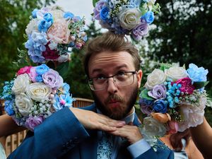 Groom poses playfully with floral wedding bouquets outdoors.

Indiana Weddings
Illinois Weddings
Michigan Weddings
Weddings