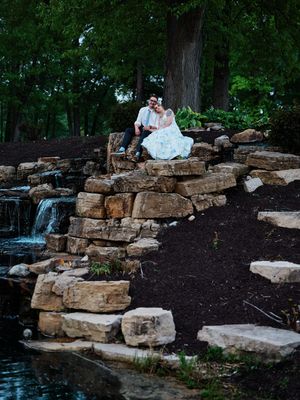 A wedding couple poses on a natural stone waterfalls and landscaping.

Indiana Weddings
Illinois Weddings
Michigan Weddings
Weddings