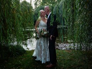 Couple poses for romantic wedding photos under weeping willow trees.

Indiana Weddings
Illinois Weddings
Michigan Weddings
Weddings