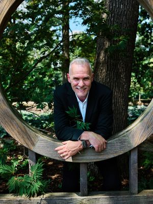 Groom leans playfully over a wooden display among tall trees.

Indiana Weddings
Illinois Weddings
Michigan Weddings
Weddings