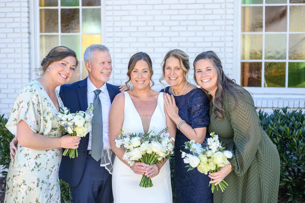A series of candid wedding party photos showing joyful moments with bouquets and formal attire against a white building.