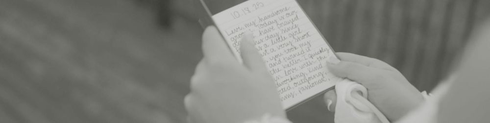 Handwritten notes and sketches on lined paper showing mathematical calculations and diagrams.