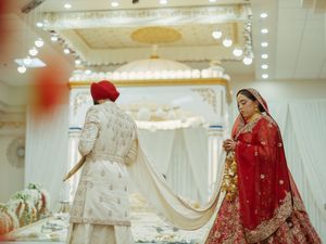 Luxurious bridal boutique interior with elegant wedding dresses on display.