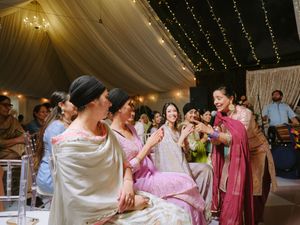 Wedding reception venue decorated with twinkling fairy lights creating a romantic ambiance.