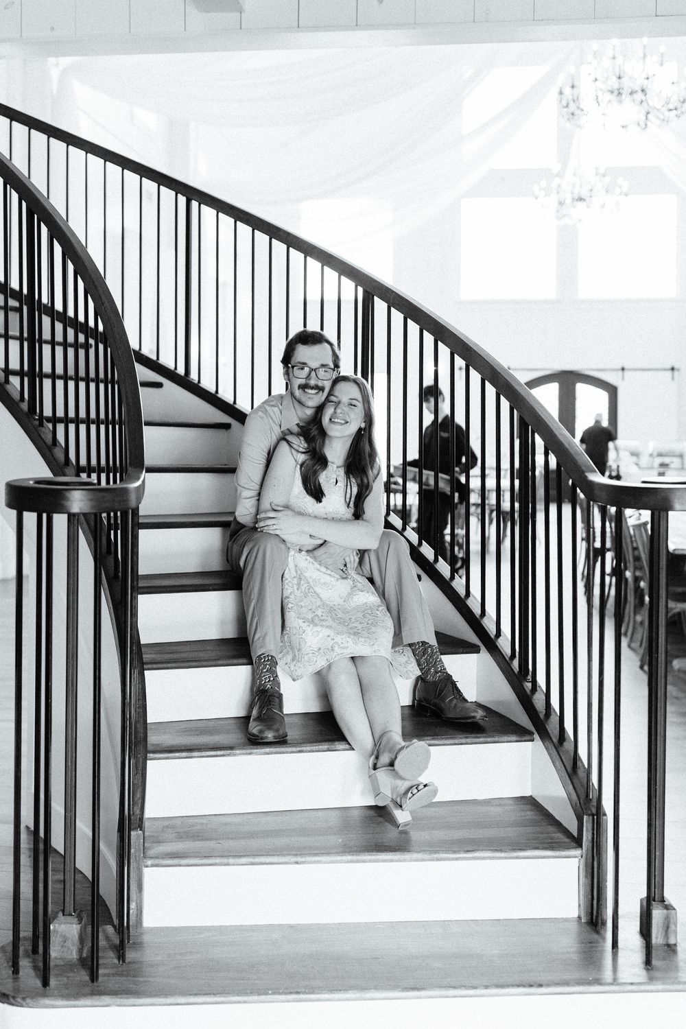A series of casual portraits taken on wooden stairs with black railings.