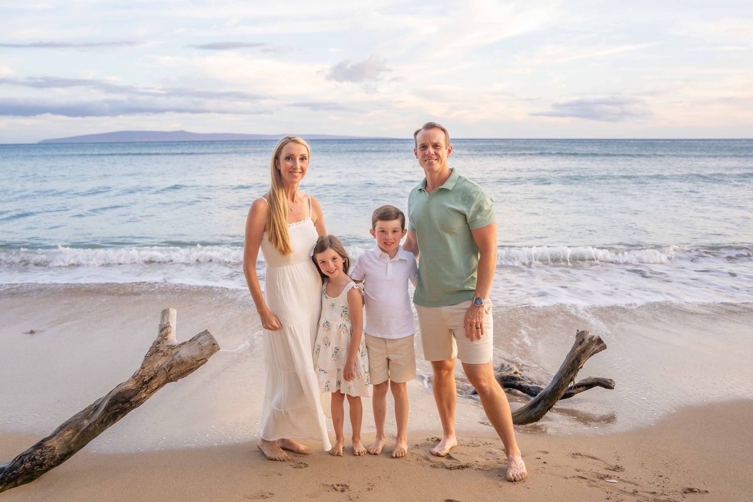 Maui family photographer photo against beautiful Maui sunset beach by ohwowfotos.
