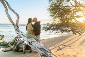 Maui family photographer photo against beautiful Maui sunset beach by ohwowfotos.