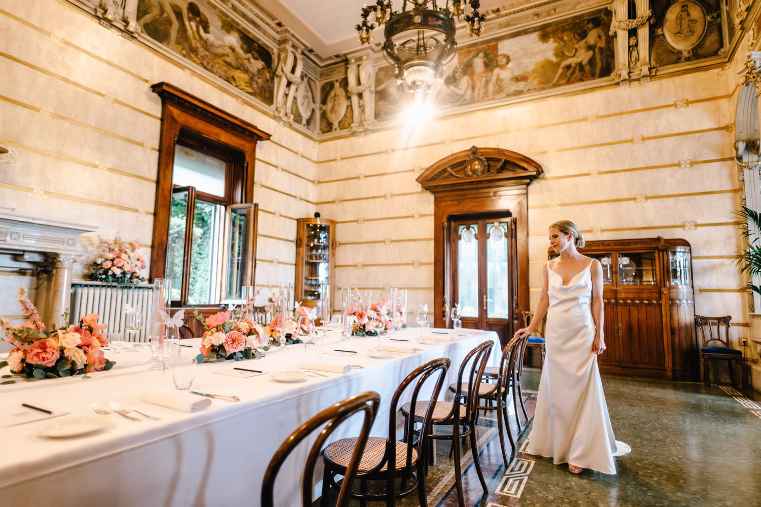A portrait of the bride inside an elegant Art-Nouveau salon with vintage charm