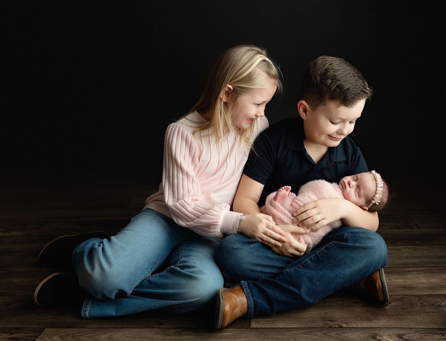 Big brother and sister looking newborn sister. Greenville, SC newborn photographer, Easley SC newborn photographer, Upstate SC newborn photo