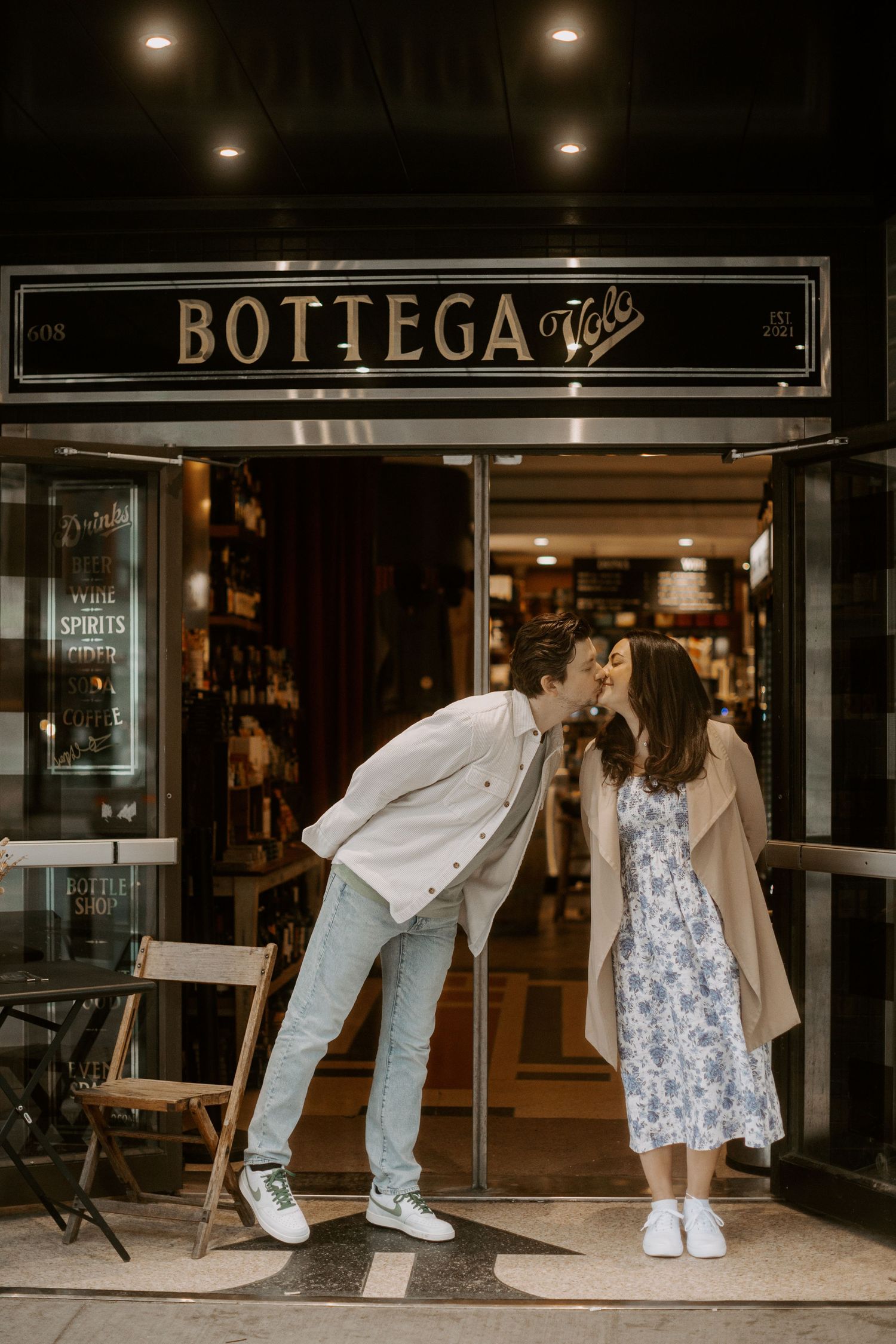 A candid city engagement session photography on College West St in Toronto
