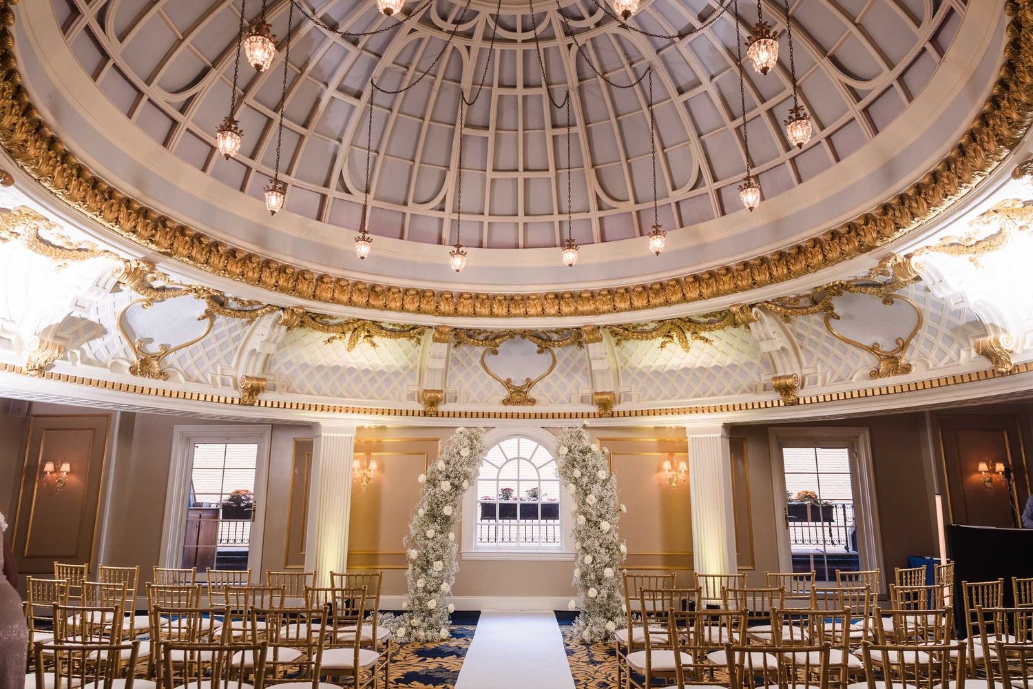 Lenox Hotel Boston Dome Room ceremony space with grand ceiling, chandeliers, and elegant wedding decor