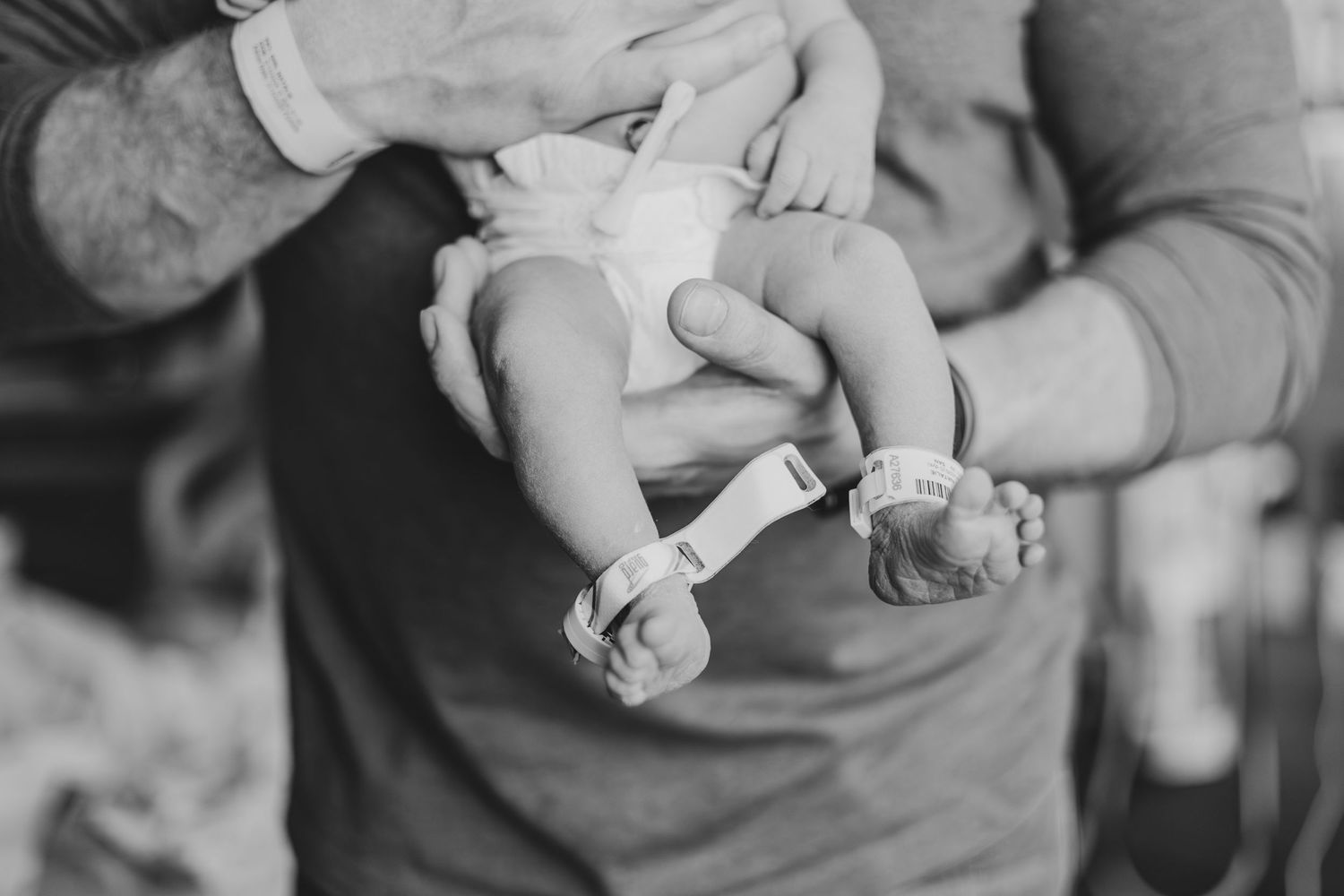 Dad holding his brand new baby during fresh 48 session | What's Labor Like for Fathers