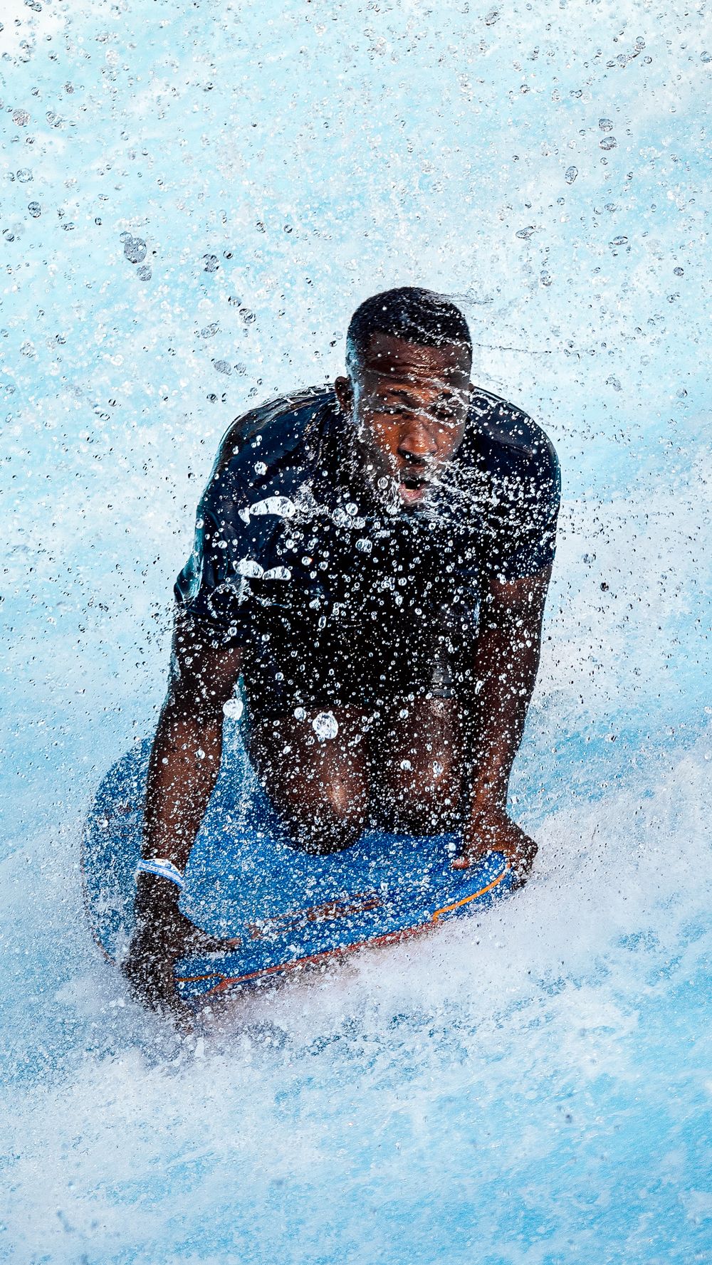 Bodyboarding at Wavesurf pool at Atlantis Hotel, Dubai. UAE. Watersports photography by Jasmina Noureldin Photography.
