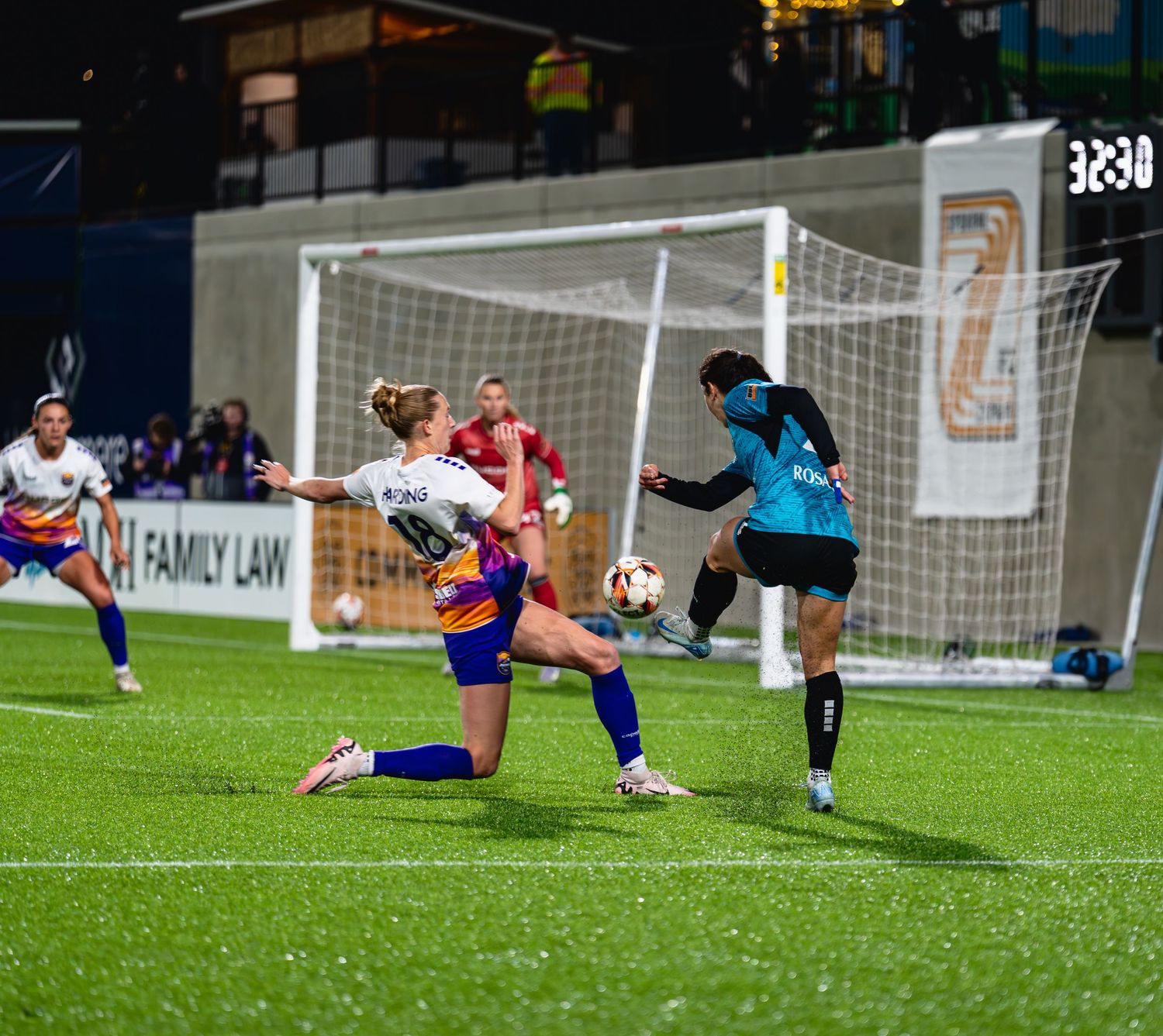A sequence of soccer action shots showing diving saves and athletic plays on a grass field during a match.