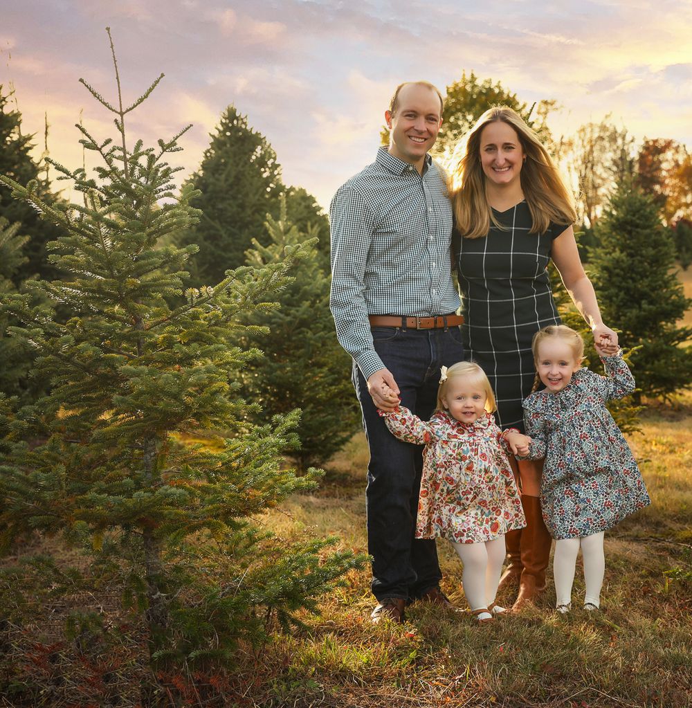 Tree farm in southern Maine New Hampshire family photographed with plaid and floral dresses